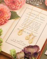 April Birthstone Daisy Huggie Earrings