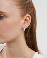 Larkspur Huggie Earrings in Silver