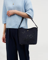 Margot Floral Applique Bucket Bag in Navy Suedette